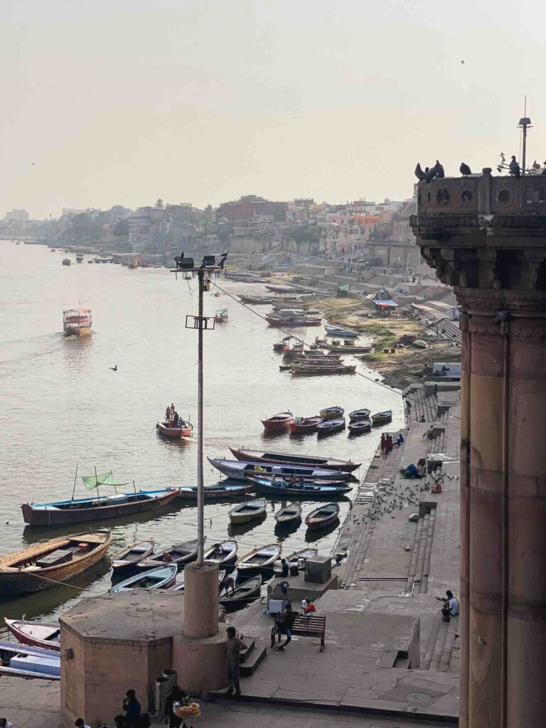 View of the boats and the Ganges from a ghat in Varanasi, India.