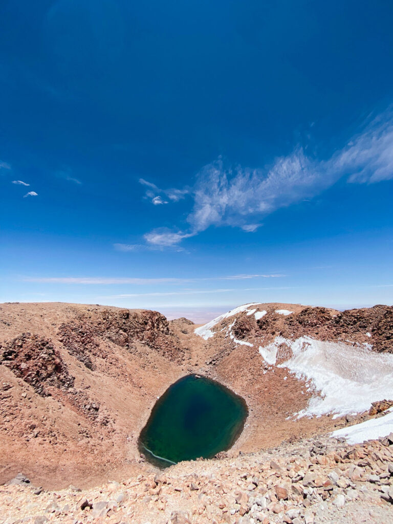View of the crater of Mount Licancabur with traces of snow, summit of the Bolivian Altiplano in Sud Lipez.