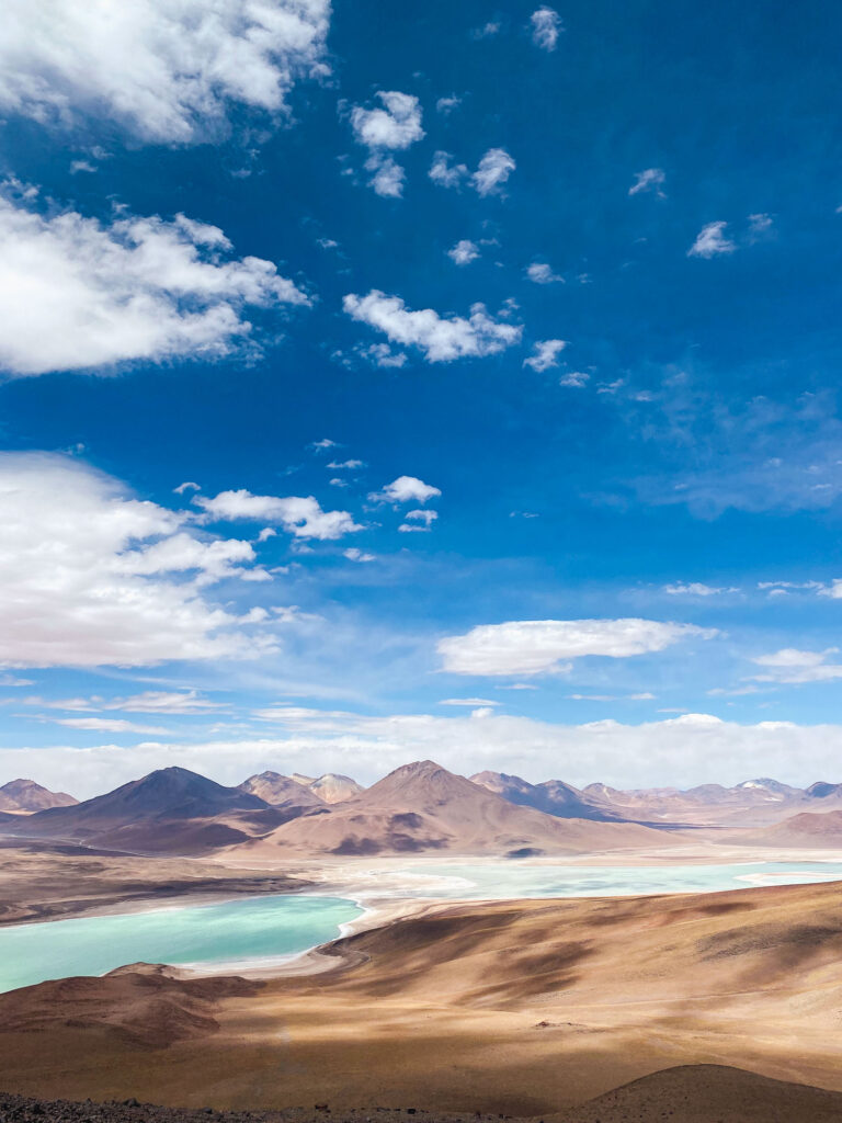 Breathtaking view of Laguna Verde from the summit of Licancabur Volcano, a unique trekking moment in Sud Lipez, Bolivia.
