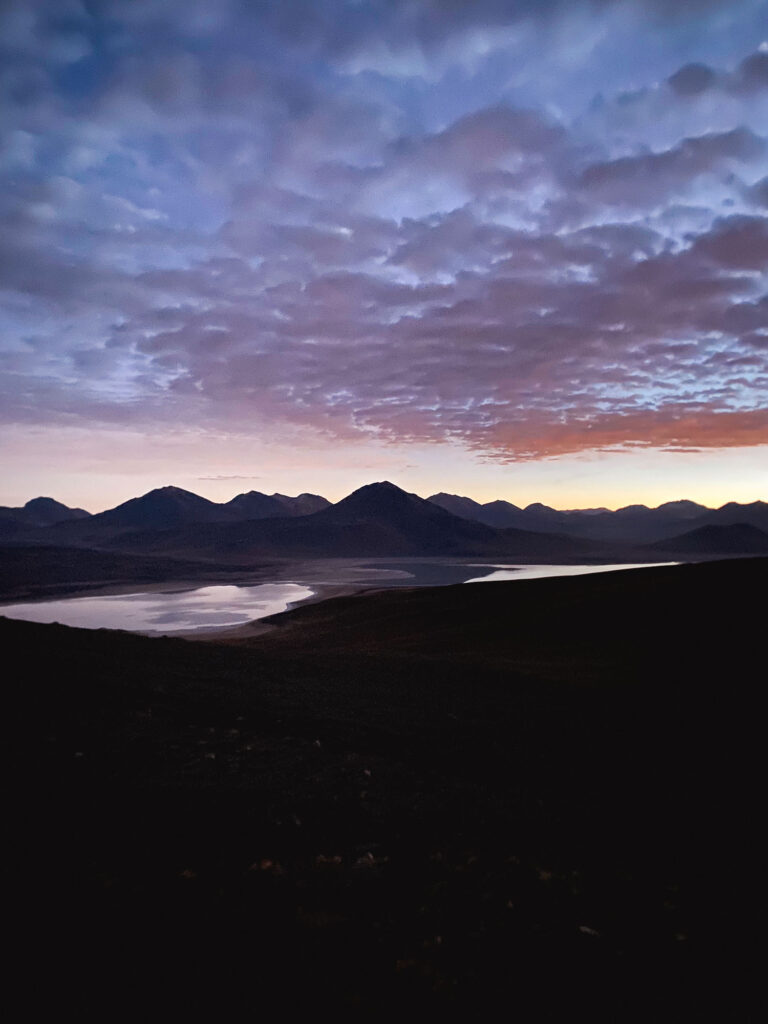 Hiking Mount Licancabur in the dark before sunrise, offering views of the Bolivian Altiplano landscapes, Sud Lipez.