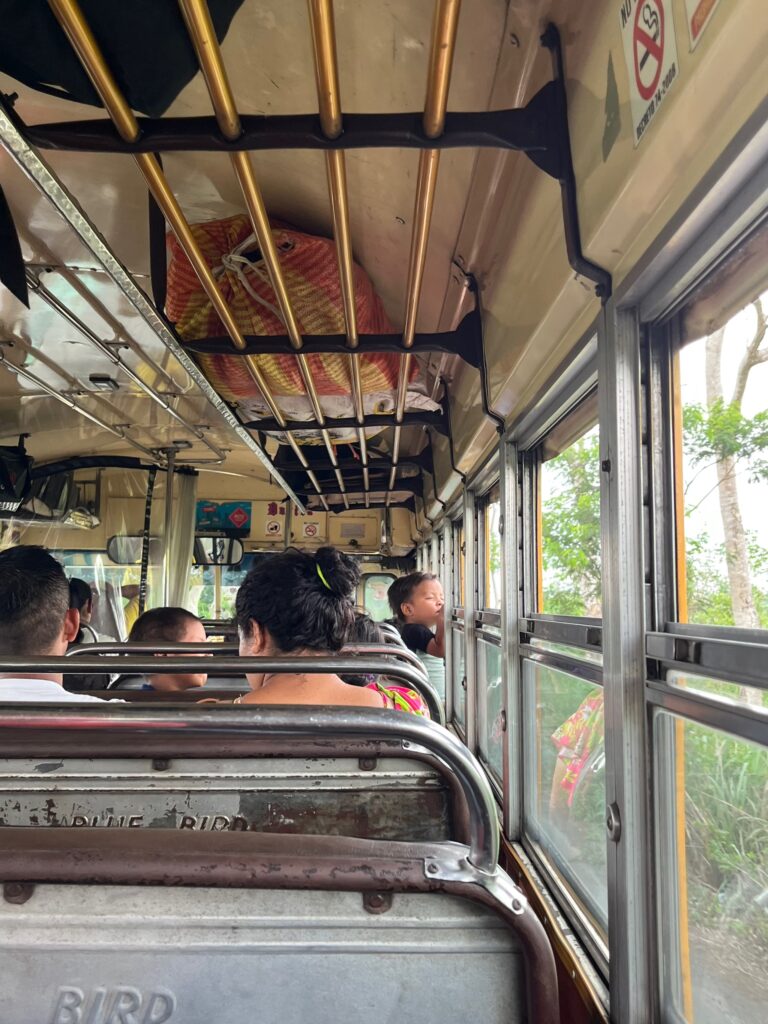 Travel scene inside a traditional Chicken Bus in Guatemala