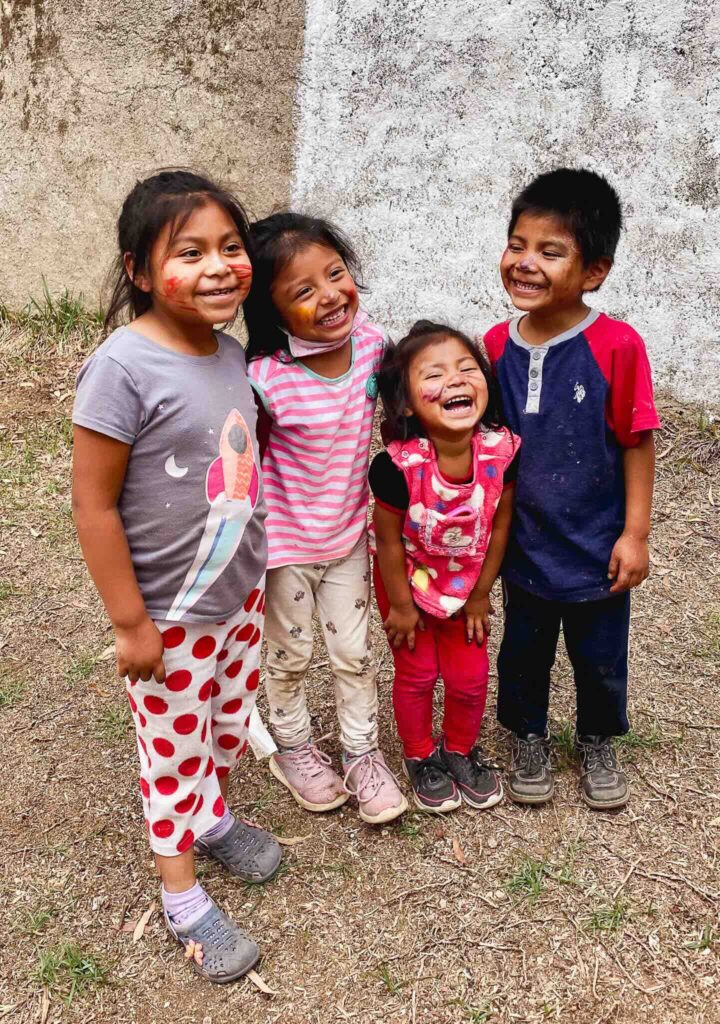 Smiling children during a volunteering experience with the I Am Hope association in Antigua Guatemala