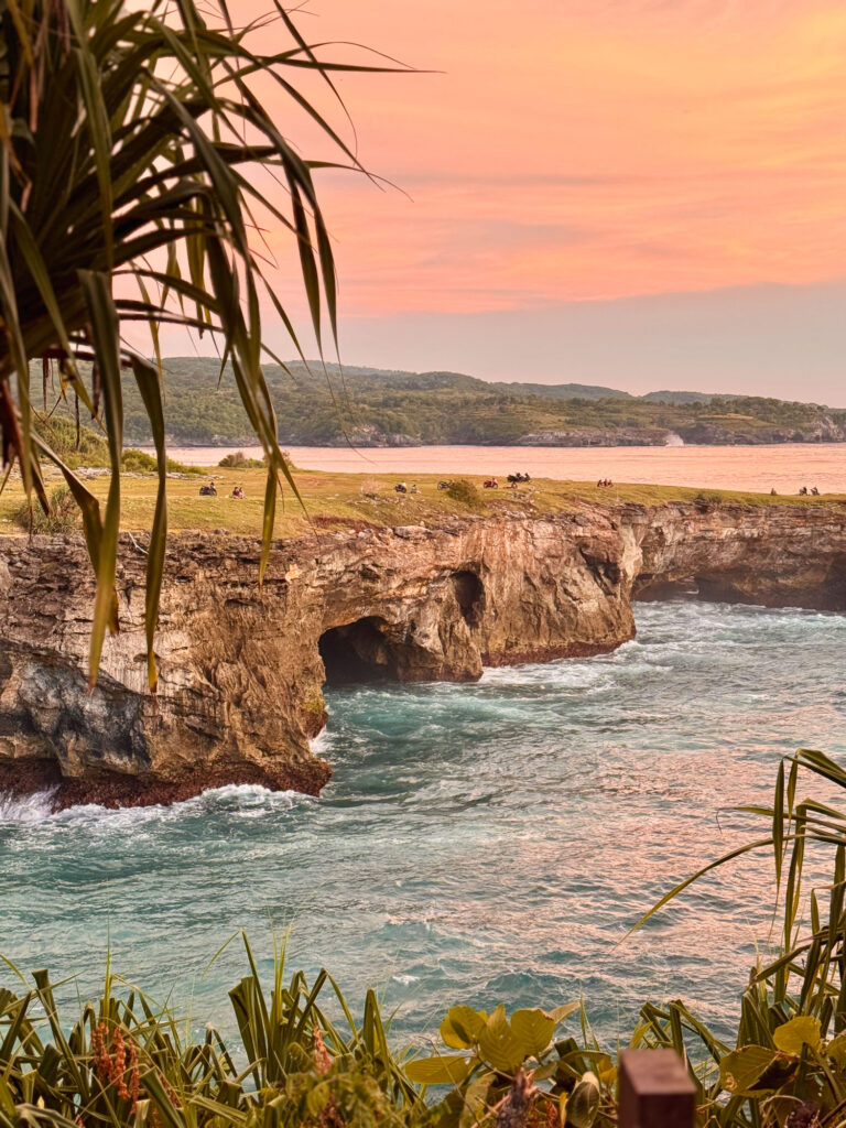 View of the cliff in Nusa Ceningan at sunset from Arna Hotel.
