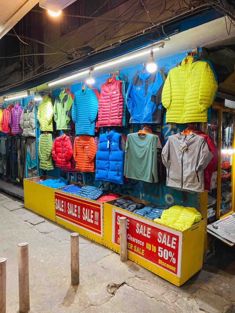 Clothing store in Kathmandu, Nepal, with jackets and trekking equipment for the Himalayas.