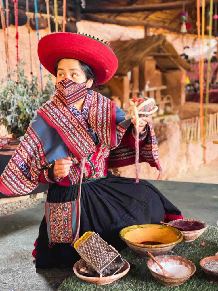 Local woman making handicrafts in the Sacred Valley – Peru travel tips.