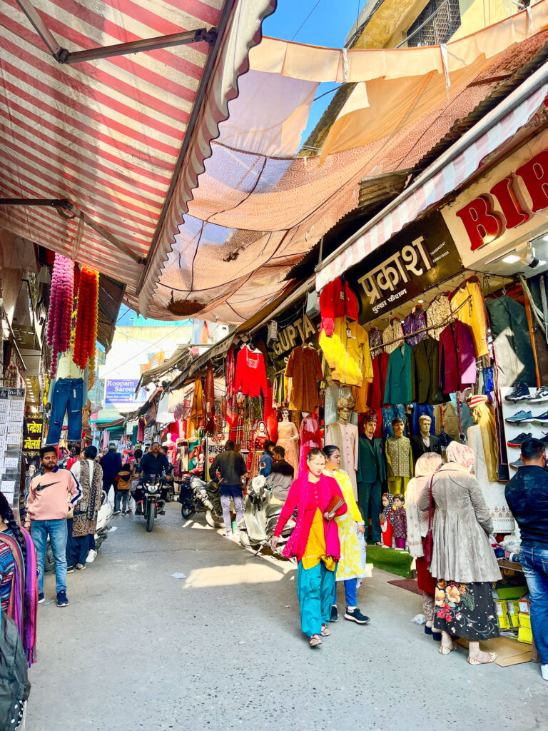 Lively and colorful street of a traditional market in Rishikesh, India