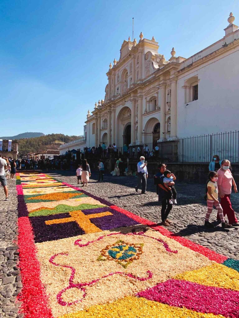 Colorful flower carpets decorating the streets of Antigua during a trip to Guatemala