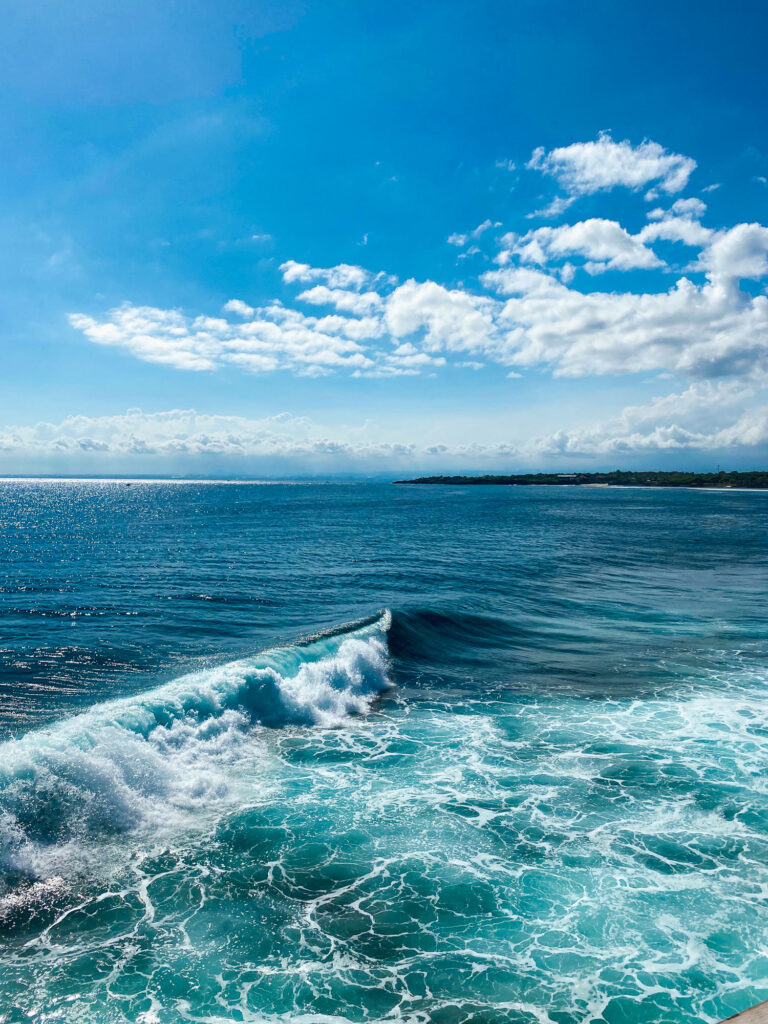 Wave at the tip of Nusa Ceningan, view from Mahana Point Warung & Bar.